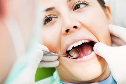 How is Holistic Tooth extraction different in Spokane